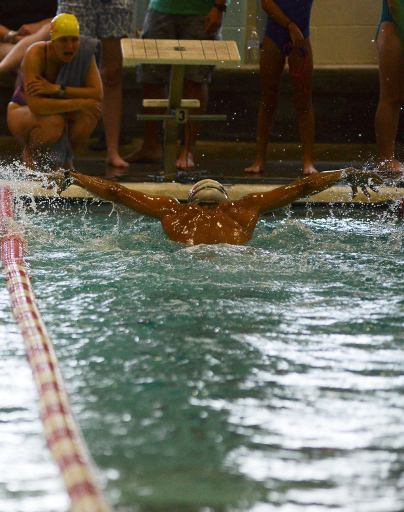 Michael Oates, 33, competes in the boys 200 yard butterfly
